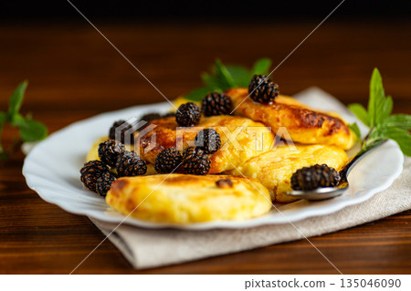 Delicious breakfast pancakes with forest pine cone jam 135046090