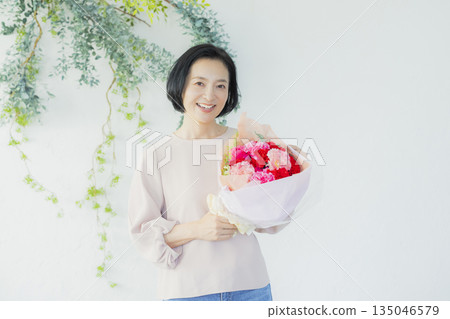 Woman with a bouquet Woman with a bouquet 135046579