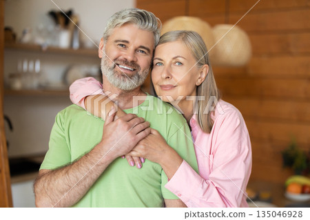Happy senior man and woman sharing affectionate moment Happy senior man and woman sharing affectionate moment 135046928