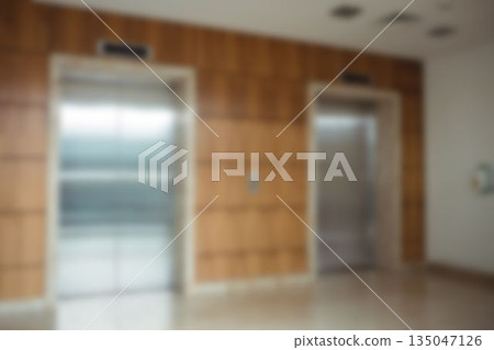 Defocused image of lift in office 135047126