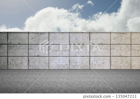 Concrete tiled wall with panel grid is being shown in flat outdoor design, featuring asphalt ground Concrete tiled wall with panel grid is being shown in flat outdoor design, featuring asphalt ground 135047211