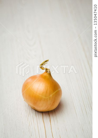 Fresh onion on wooden table Fresh onion on wooden table 135047410