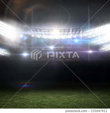Stadium interior is glowing at night in flat design, showing curved floodlight rig and grass pitch 135047411