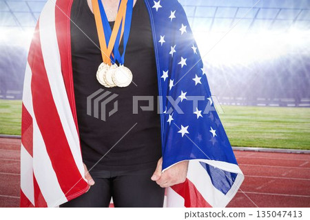Midsection of athlete with American Flag at stadium Midsection of athlete with American Flag at stadium 135047413