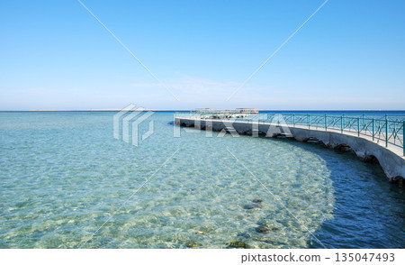 Concrete pier at the beach in Hurghada, Egypt. 135047493