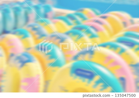 Blurred photo of inflatable water slide rings, summer abstract background or wallpaper. 135047500