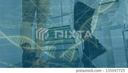 Two colleagues ascending staircase in office lobby, with metal glass and digital DNA code graphics Two colleagues ascending staircase in office lobby, with metal glass and digital DNA code graphics 135047725