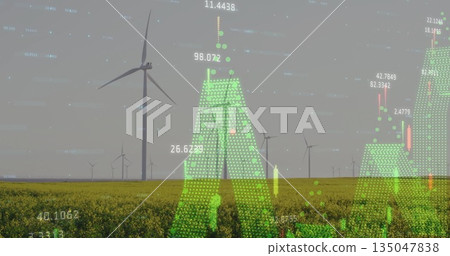Displaying large white wind turbine rotating over yellow crop field, with green digital data charts 135047838