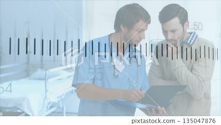 Reviewing doctor in blue scrubs consulting patient in exam room, with clipboard and stethoscope Reviewing doctor in blue scrubs consulting patient in exam room, with clipboard and stethoscope 135047876