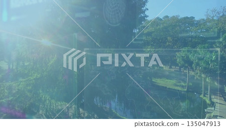 Displaying UI overlay mapping world data over pond path in city park with benches, sun glare 135047913