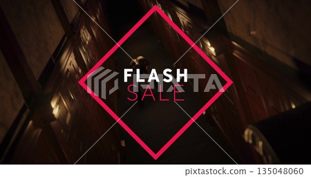 Walking adult male wearing overcoat in hotel corridor, with red diamond-shaped FLASH SALE graphic Walking adult male wearing overcoat in hotel corridor, with red diamond-shaped FLASH SALE graphic 135048060