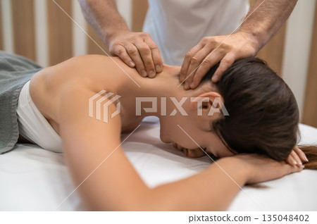 Close up picture of a woman having massage session Close up picture of a woman having massage session 135048402