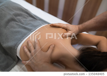 Close up picture of a woman having massage session 135048405