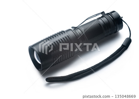 hand flashlight close-up, on a white isolated hand flashlight close-up, on a white isolated 135048669