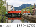 Kiha 47 running through Kinosaki Onsen town 135048755
