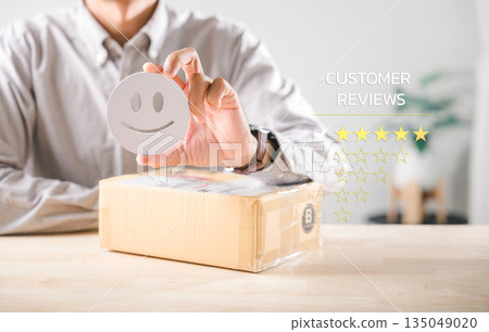 Shopping customer experience concept with person giving positive feedback for online delivery box, demonstrating happy satisfaction with service review survey, enhancing brand reputation 135049020