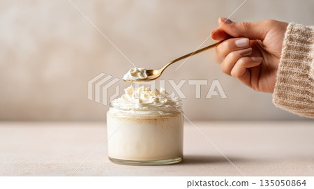 Creamy dessert in a glass jar Creamy dessert in a glass jar 135050864