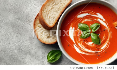 Tomato soup with basil and bread Tomato soup with basil and bread 135050881