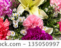 Beautiful mixed flower bouquet with carnations, lilies and daisies 135050997
