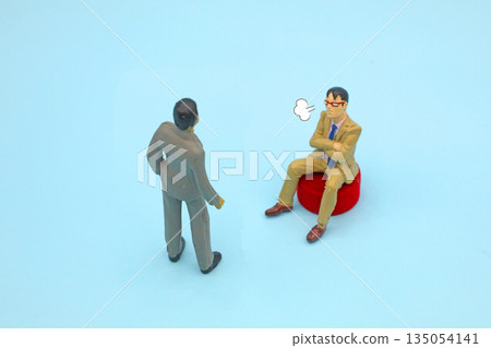 Image of a subordinate being lectured by his boss 135054141
