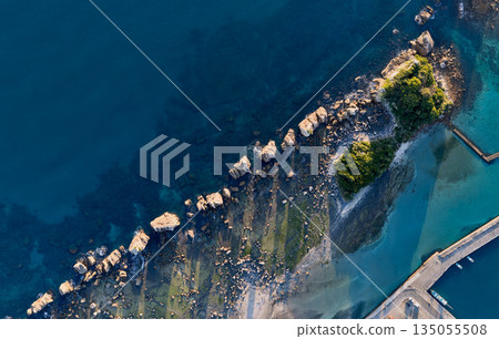 Aerial drone shot from directly above overlooking the reefs and shallows of Hashiguiiwa 135055508