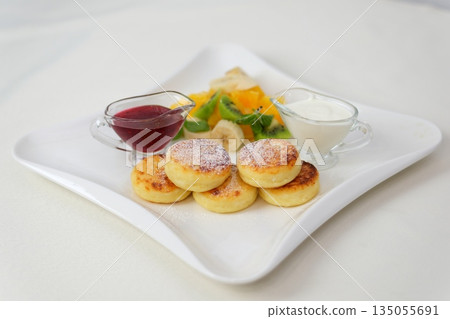 Japanese Souffle Pancakes : fluffy Japanese souffle pancakes dusted with powdered sugar and garnished with fresh mint, sweet breakfast or brunch treat photography 135055691