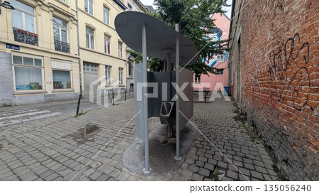 Local public men's toilet in the city Local public men's toilet in the city 135056240