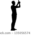 Black silhouette of a standing man on a white background 135056574