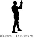 Black silhouette of a standing man on a white background 135056576