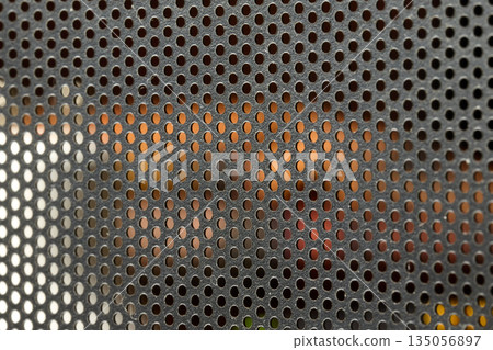 Black Perforated Metal Mesh Texture with Blurred Background. High quality photo Black Perforated Metal Mesh Texture with Blurred Background. High quality photo 135056897
