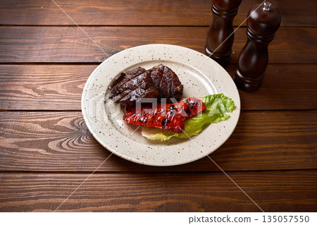 Grilled Beef Steak With Roasted Pepper 135057550
