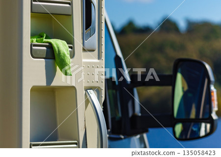 Rv caravan on lake shore Rv caravan on lake shore 135058423