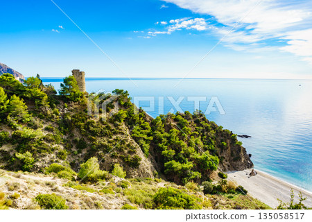 Spanish sea coast with tower, Andalusia 135058517