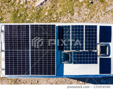 Caravan solar panels on roof camping on nature. Aerial view 135058580