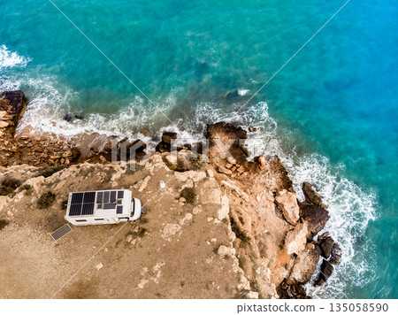 Camper on coast in Spain. Aerial view Camper on coast in Spain. Aerial view 135058590