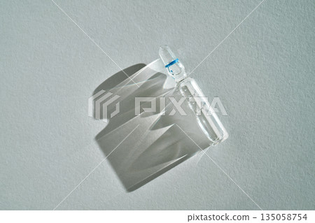 Glass ampoule containing medical liquid with light effects Glass ampoule containing medical liquid with light effects 135058754