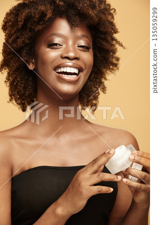 Smiling model doing daily skin care routine at home. Smiling model doing daily skin care routine at home. 135059299