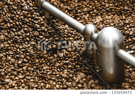 Rotating Roasted Coffee Cooling Tray in Coffee Roasting Facility Rotating Roasted Coffee Cooling Tray in Coffee Roasting Facility 135059473
