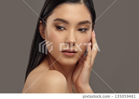 Closeup portrait of young woman with healthy skin. Closeup portrait of young woman with healthy skin. 135059481