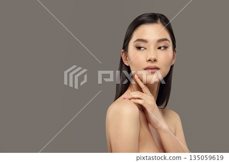 Beauty portrait of dark-haired girl with oriental appearance. 135059619