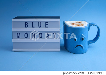Blue monday lightbox with sad coffee cup Blue monday lightbox with sad coffee cup 135059999