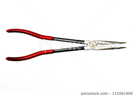 Long nose pliers with red handles isolated on white background, hand tool for precision work 135061906