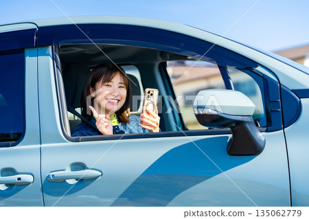 Woman on a road trip 135062779