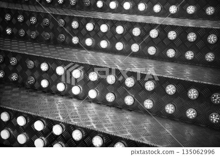 Steps with light bulbs in the park amused Steps with light bulbs in the park amused 135062996