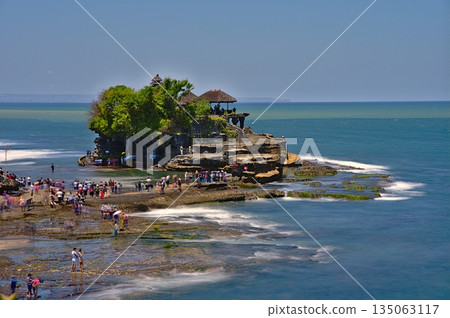 Pura Tanah Lot temple on Bali at day time Pura Tanah Lot temple on Bali at day time 135063117