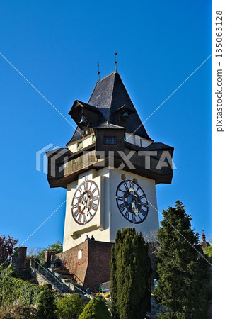 Historic clocktower of Graz, the town's landmark Historic clocktower of Graz, the town's landmark 135063128