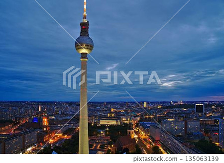 Berlin tv tower photographed during sunset with long exposure Berlin tv tower photographed during sunset with long exposure 135063139