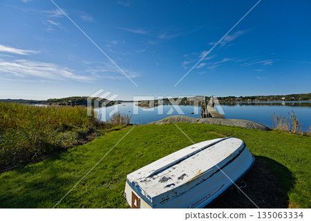 Small boat on the skerry island Asperoe with sea view 135063334