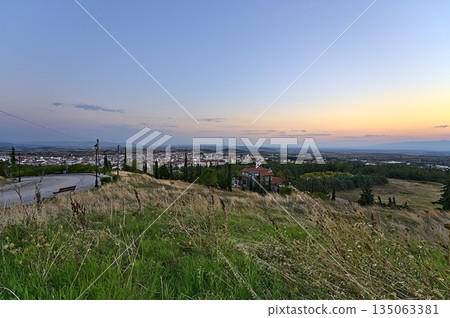 Kilkis skyline from St. George Hill at sunset Kilkis skyline from St. George Hill at sunset 135063381