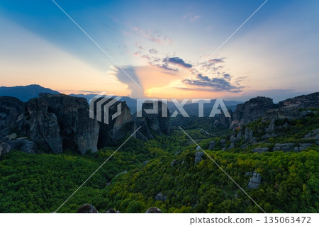 Monastery of Varlaam, Saint Nicholas, Rousanou and Megalo Meteoro at sunset Monastery of Varlaam, Saint Nicholas, Rousanou and Megalo Meteoro at sunset 135063472